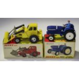 A Dinky Toys No. 308 Leyland 384 tractor, boxed with packing piece, together with a No. 437 Muir