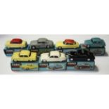 Seven Corgi Toys cars, comprising a No. 200 Ford Consul Saloon, a No. 201 Austin Cambridge Saloon, a