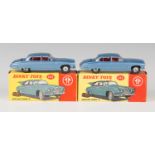 Two Dinky Toys No. 142 Jaguars Mark X, both finished in metallic blue with spun hubs and