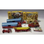 A collection of die-cast vehicles, including a Corgi Toys The Beatles Yellow Submarine,