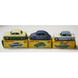 Three Dinky Toys cars, comprising a No. 162 Ford Zephyr saloon, finished in cream and green, a No.