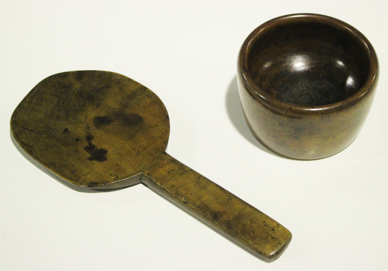 A 19th century fruitwood spoon, length 20cm, together with a turned treen pot, diameter 9cm.Buyer’ - Image 2 of 2