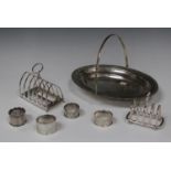 A George V silver six-division toast rack of arched form, Sheffield 1913 by James Dixon & Son,