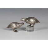 A pair of silver models of grouse with engraved plumage, London 1964 by Nat Leslie Ltd, length 12.
