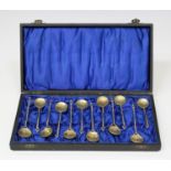 A set of twelve gilt spoons, each dished bowl formed from a Friedrich August II of Saxony 1/6th