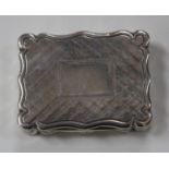 An early Victorian silver rectangular vinaigrette with engine turned lattice decoration within a