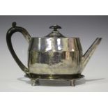A George III silver oval teapot and stand, the teapot of horizontal faceted form with faceted