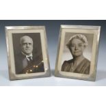 A pair of George VI silver rectangular photograph frames with overall engine turned decoration,