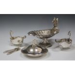 A plated nut dish with scallop shell bowl, the rim surmounted with a squirrel, raised on a reeded