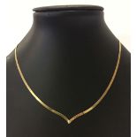 9ct gold wishbone style necklace. Weight approx 2.4g.