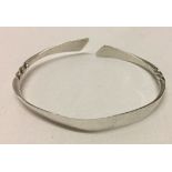 A hallmarked silver torque bangle.