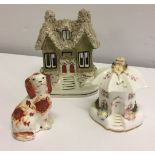 A house pastille burner, an umbrella house pastille burner and a small Staffordshire Spaniel, 7cm (3