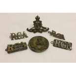 A collection of WW1 artillery badges comprising Gun Layers badge, 4 x RGA (Royal Garrison Artillery)