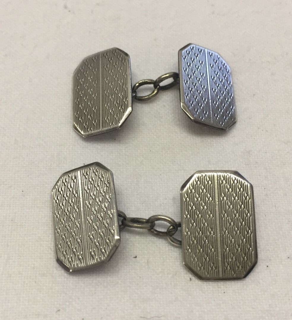 A pair of gents silver cufflinks, London 1937.