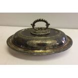 A silver plated lidded serving dish.