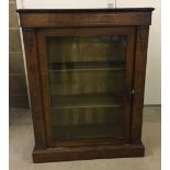 A Victorian glass fronted display cabinet with inlaid detail to front. Approx 75 x 98cm.