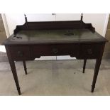 A dark oak 3 drawer desk with leather insert (a/f) to top. Approx 107cm wide x 95cm high with