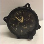 A vintage black bakelite altimeter for British Aircraft made by Smiths, Mk 4C with War Dept arrow.