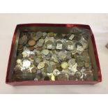 A tray of various world coins.