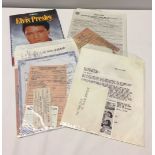 A quantity of Elvis Presley memorabilia to include a picture book and a large selection of facsimile