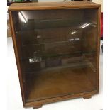 A slope glass fronted display cabinet with internal shelves. Approx 46 x 53cm.