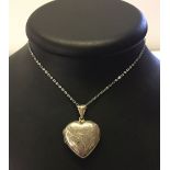 Large engraved 925 silver hinged heart shaped locket, on a 24" sterling silver chain. Locket