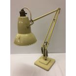 A vintage Herbert Terry anglepoise table lamp in cream.