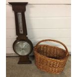 A vintage wall hanging oak framed barometer. Approx 66cm high.