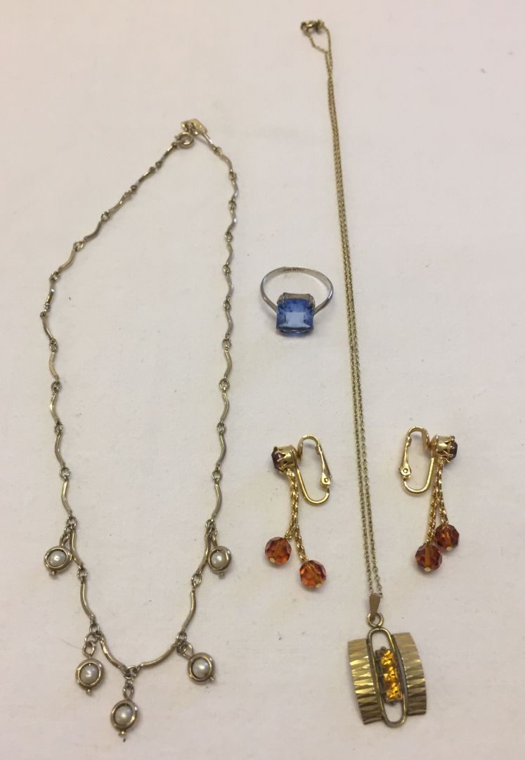 Gold plated pendant & chain set with orange stones together with a gold plated ring set with a large