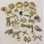 A quantity of quality gold tone costume jewellery to include Hollywood and Exqusite.