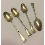 4 silver teaspoons with decorative handles. Hallmarked Sheffield 1963. Approx weight 54.9g.