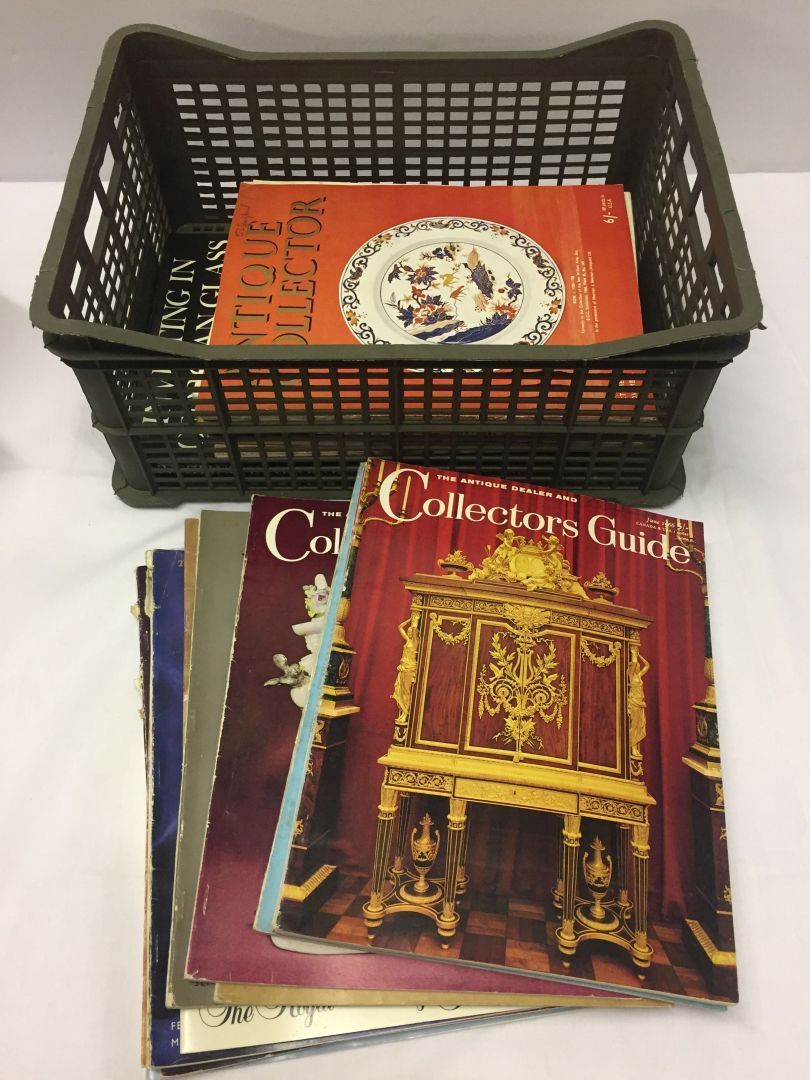 A collection of Antique Dealer Collectors Guides magazines and books.