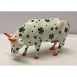 A ceramic cow parade figurine No 6006 'Lucky Cow' dated 2002.