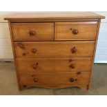 A modern pine 2 over 3 chest of drawers approx 85 x 81cm.