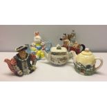 5 character teapots to include Henry VIII and Noahs Ark.