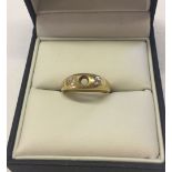 18ct gold ring with 2 diamonds approx 0.07pt and central stone missing. Size O1/2, weight approx 4.