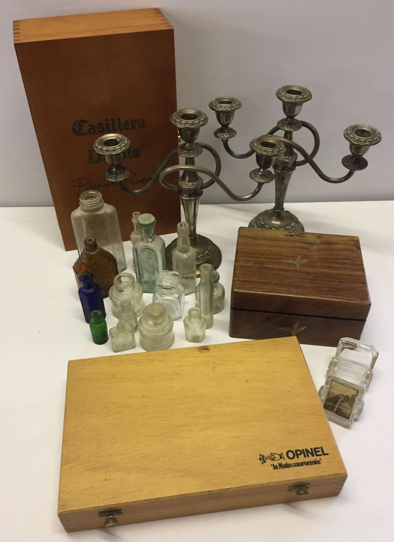 A mixed lot of misc items comprising wooden boxes vintage glass bottles and a pair of silver