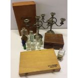 A mixed lot of misc items comprising wooden boxes vintage glass bottles and a pair of silver