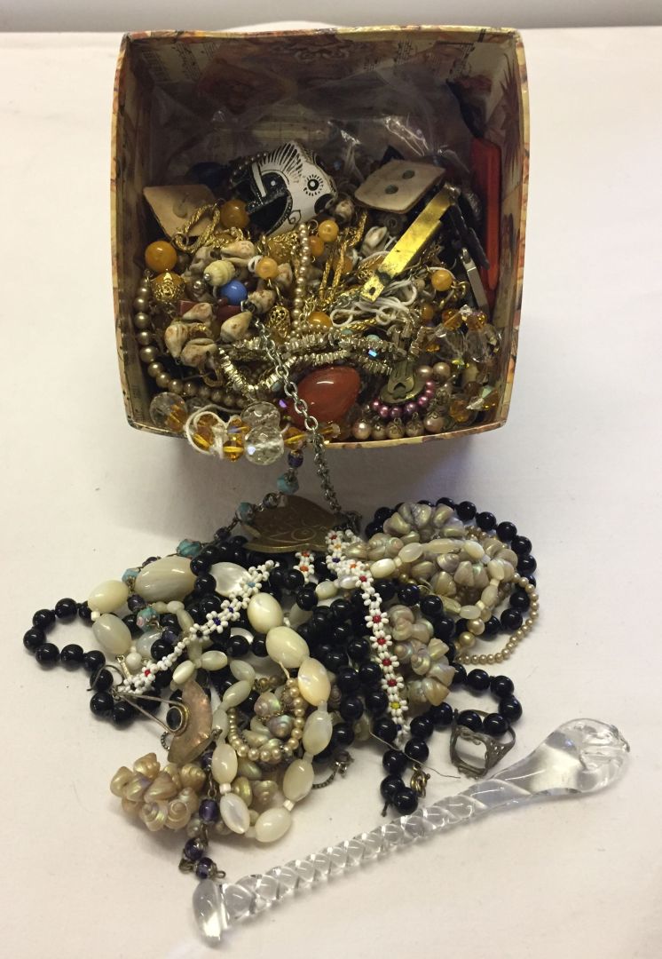 A square box of mostly vintage costume jewellery plus a glass sugar crusher.