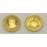 Gold Kennedy medallion. 1g weight.