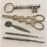 Silver plated ornamental key approx 15cm long together with a pair of silver plated grape