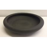 A Wedgwood black basalt bowl, 35cm diameter.