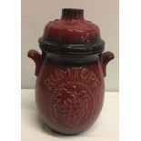 A large red and black ceramic rumtopf. 29cm tall approx.