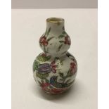 A miniature Chinese double gourd vase 8cm tall.