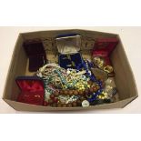 A shoe box of mixed costume jewellery to include beaded necklaces, cufflinks and earrings.