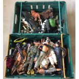 A crate of Action Man figures together with a crate of Action Man animals.