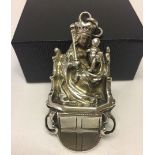 Large white metal pendant depicting Mary Queen of Heaven holding baby Jesus. Approx 7cm long x 3.5cm