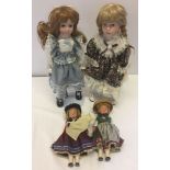 4 dolls: 2 boxed modern bisque head and 2 1960s Bavarian dolls in national costume.