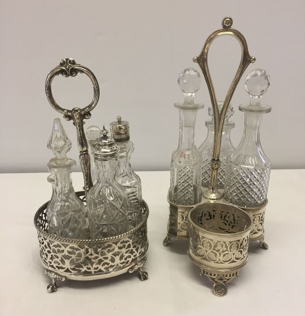 2 Victorian silver plated cruet stands and bottles.