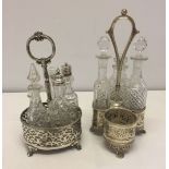 2 Victorian silver plated cruet stands and bottles.